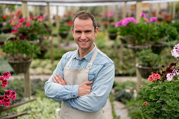 istock Man working at a garden center 618634772
