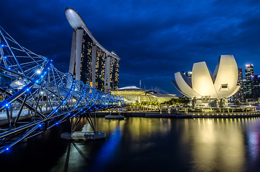 Marina Bay, Singapore - June 26, 2016: A beautiful blue hour at Marina Bay with Marina Bay Sands Hotel at the background, one of the most spectacular Hotel in Singapore.