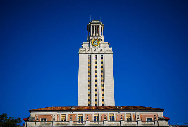 istock UT Tower standing in Austin with Blue Sky 618635356