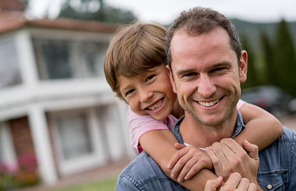 istock Happy father and son at the park 618635386