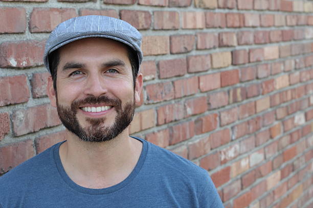istock Portrait of handsome bearded man smiling 618635632