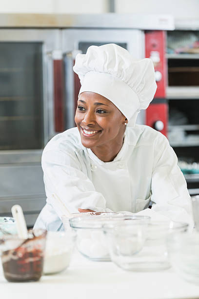 istock African American female chef in commercial kitchen 618637106
