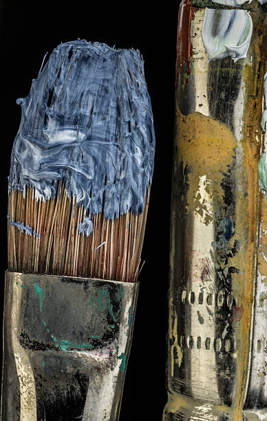 istock oil colors on paintbrushes 618637336