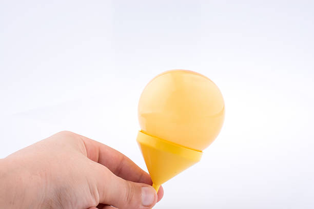 istock Balloon in a funnel on white background 618637418
