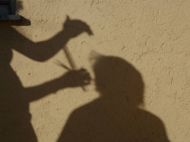istock woman cutting hair 618639292