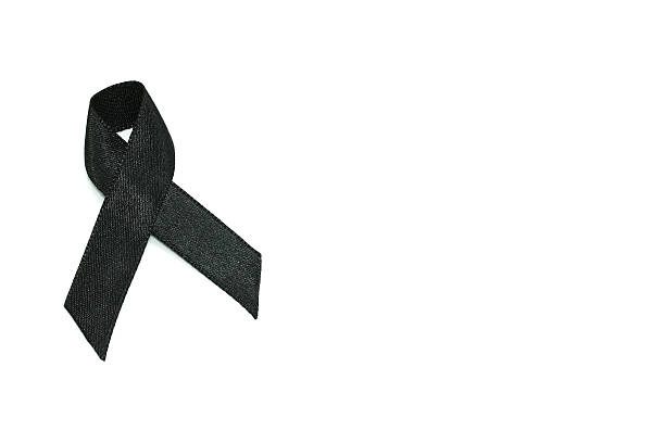 istock black ribbon for mourning concept isolated on white 618639998