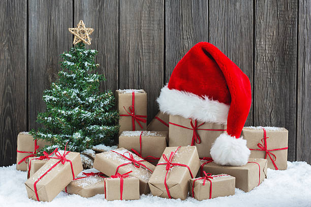 istock Vintage packages, Christmas tree and Santa Hat 618642914