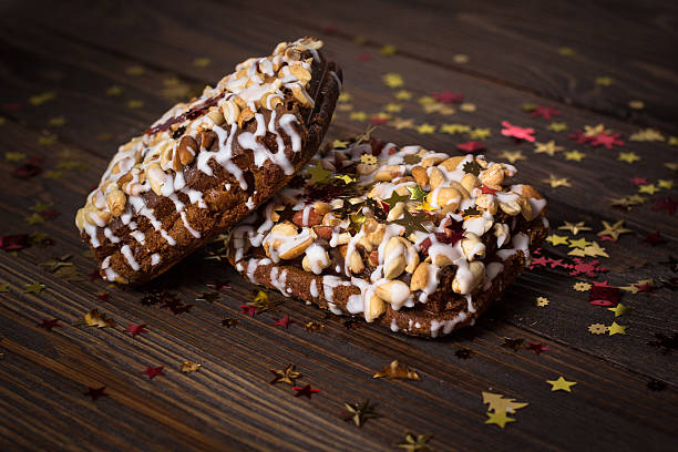istock piece of cake, cookies with nuts and white icing, Christmas 618643026