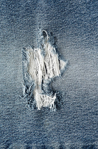 istock .Denim jeans texture or denim jeans background with old torn. 618643052
