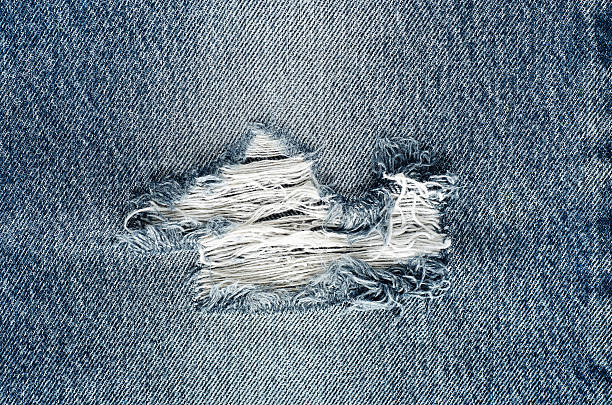 istock .Denim jeans texture or denim jeans background with old torn. 618643720