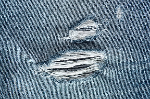 istock .Denim jeans texture or denim jeans background with old torn. 618643794