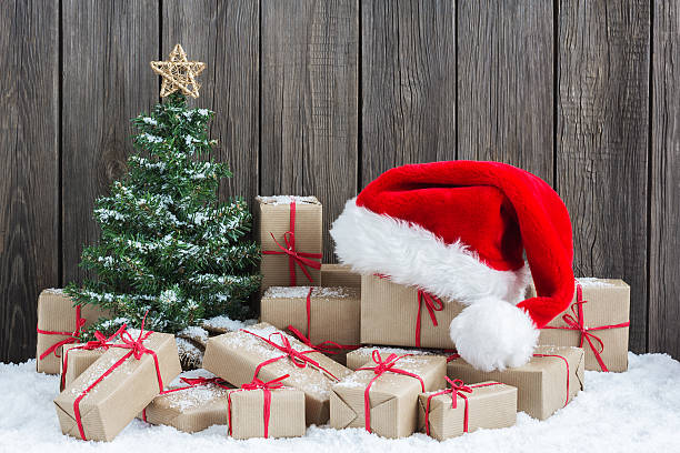istock Vintage packages, Christmas tree and Santa Hat 618645918