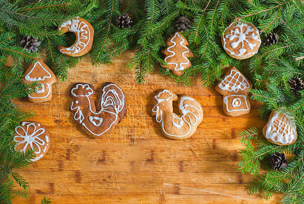 istock Branches of a Christmas tree decorated with gingerbread cookies 618646292