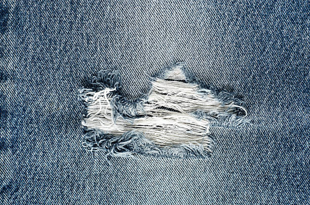 istock .Denim jeans texture or denim jeans background with old torn. 618646648