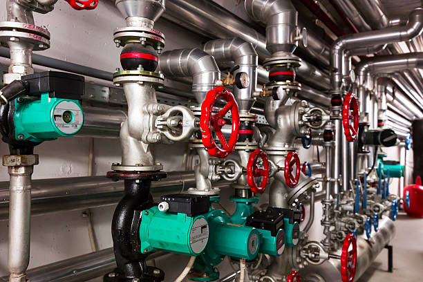 heating system control equipment office building heating system control equipment piping hot stock pictures, royalty-free photos & images