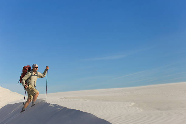 istock The journey in the desert on the white dunes. 618652658