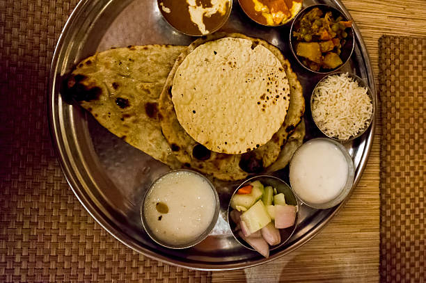 istock Rice, pulses, flat bread north indian meal 618653618