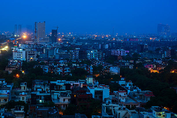 istock Buildings at dusk in Noida India 618655026