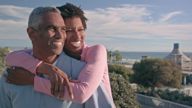 Happy African American Couple Embrace near Beach
