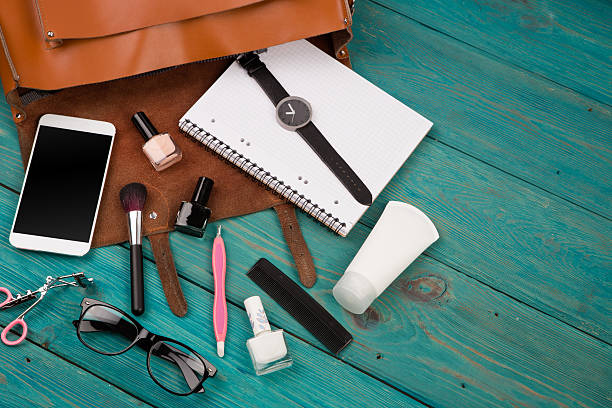 istock women set with bag, phone, notepad, purse, watch, glasses 618720182