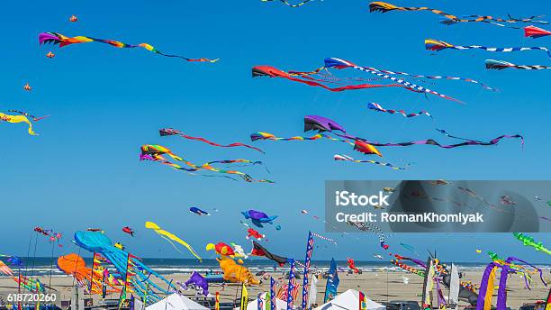 Colorful Kites Against A Blue Sky Stock Photo - Download Image Now - Kite - Toy, Traditional Festival, Flying