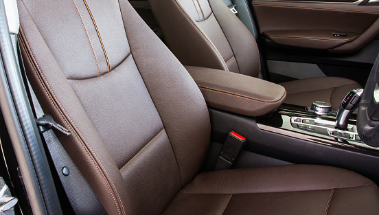 A close up photograph of a modern car seatbelt.