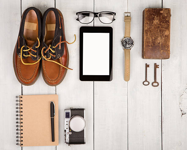 istock shoes, camera, tablet pc, notepad, watch, glasses, casket and keys 618721178
