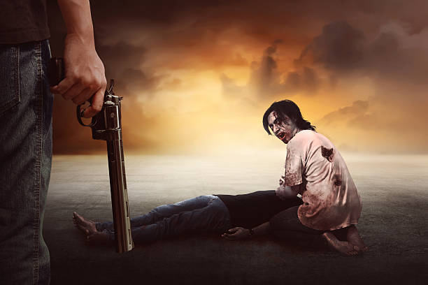 istock Brave man with jeans pants holding gun looking at zombie 618724152