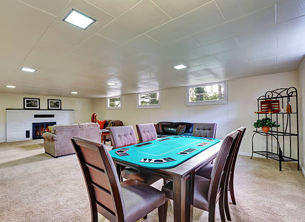 istock Entertainment Room with fireplace and poker Table 618724672