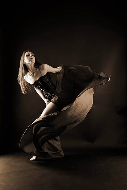 istock woman modern dancer in ballroom 618724880