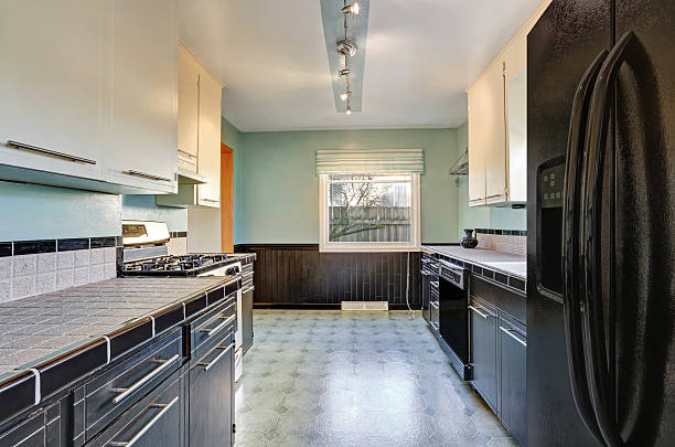 istock Kitchen interior in black and green tones 618725142