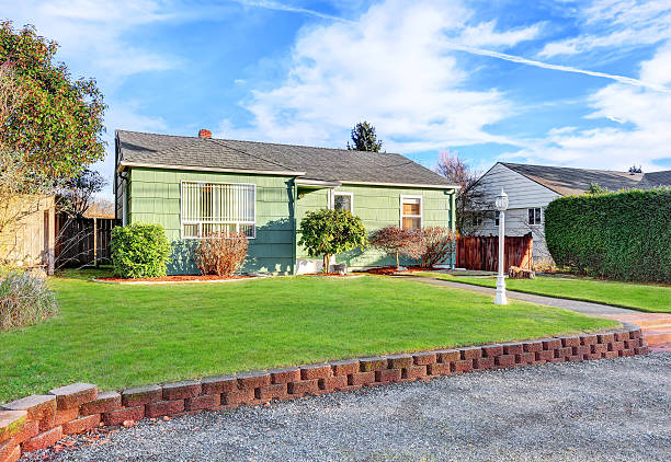 istock Green Suburban Bungalow style home 618725350