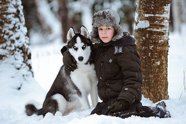 istock Little boy with the dog 618725428