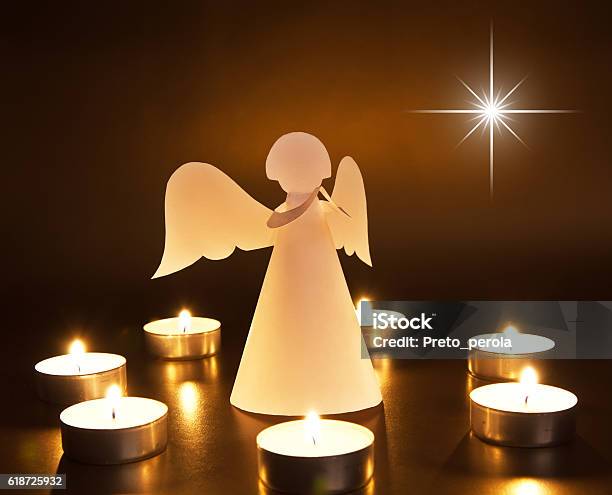 Christmas Angel With Candles Stock Photo - Download Image Now - Angel, Black Color, Candle