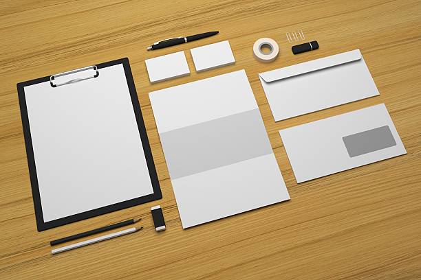istock Empty 3d illustration stationery on wooden background. 618727026