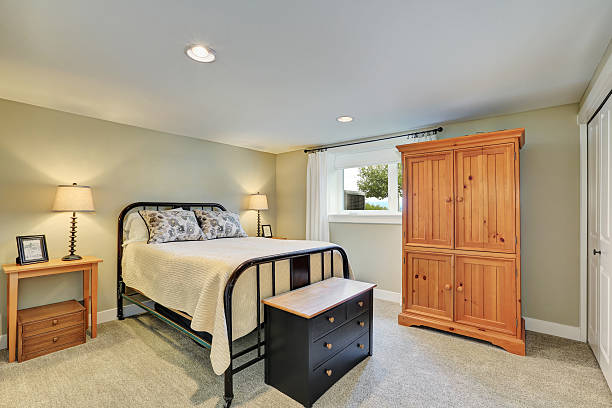 istock Beige tone bedroom interior with iron bed 618727430