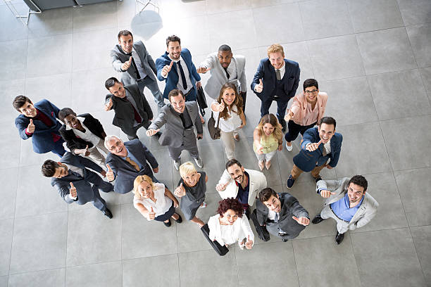 istock looking at camera giving thumbs up 618728826