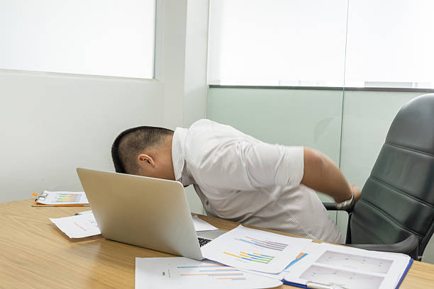 istock Backache is a popular sick of office worker nowadays 618728944