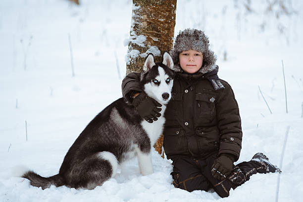 istock Little boy with the dog 618729350