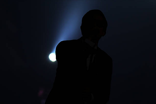 istock Silhouette of singer. 618730546
