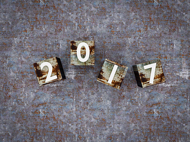 istock top view metallic cubes with 2017 against metal texture 618733906
