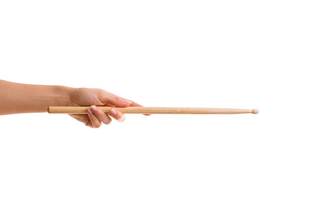 istock woman holding drum stick close up 618735388
