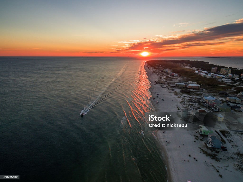 Aerial/Drone Photo of a beautiful sunset over Gulf Shores Alabama Gulf Shores is famous for its white sand beaches and great weather Gulf Shores Stock Photo