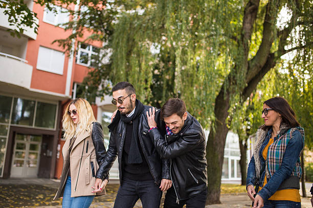 istock Having a laugh in the park with friends 618739162