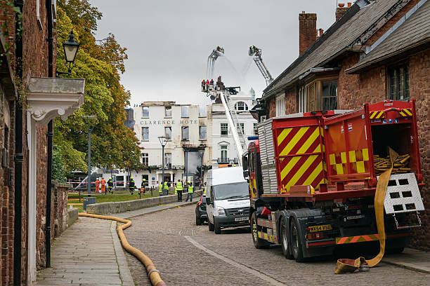 Firemen put out the fire at Royal Clarence Hotel stock photo