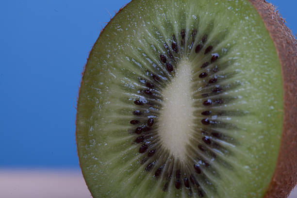 istock Close up of half cut kiwifruit 618739638