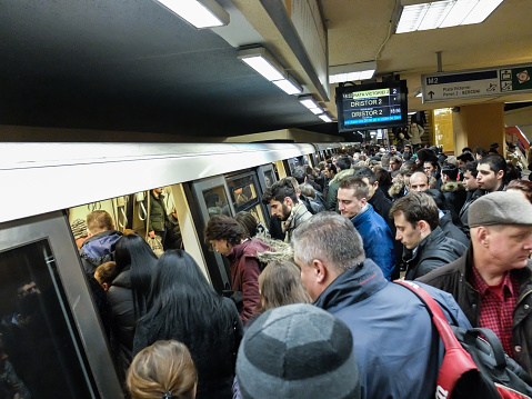 Bucharest, Romania, 1 February 2016: People travel with metro train at a rush hour in Bucharest.