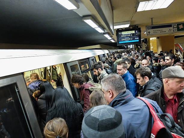 Subway crowd Bucharest, Romania, 1 February 2016: People travel with metro train at a rush hour in Bucharest. bucharest people stock pictures, royalty-free photos & images