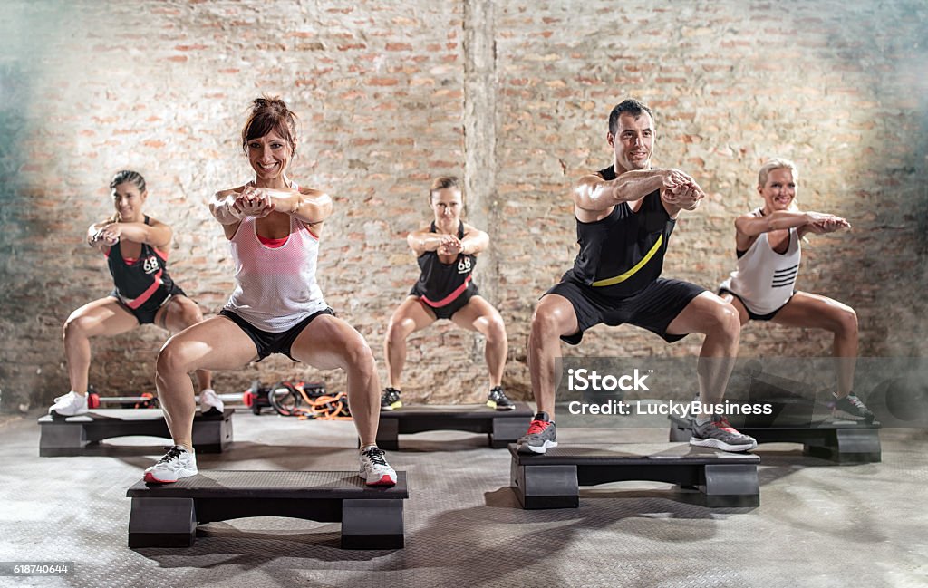 Class of  stepping Group of people having  step training Exercising Stock Photo