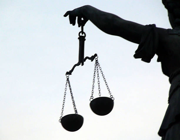 istock Lady Justice Holding Weight Scale Without Sword 618740676